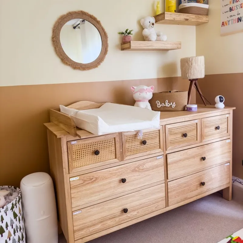 Oak chest of drawers with cane fronts in a nursery