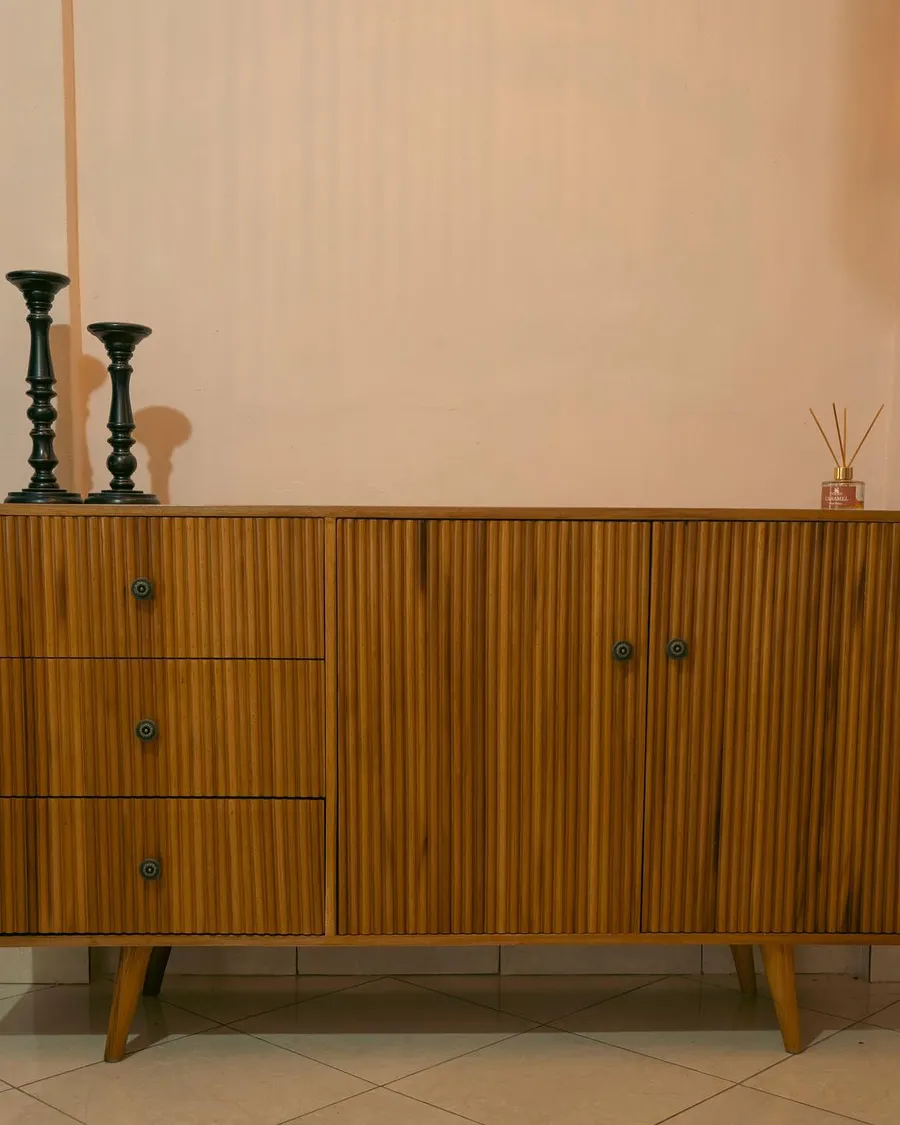 Fluted teak sideboard with drawers and two doors